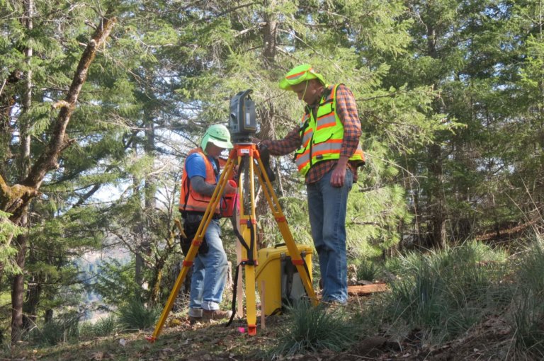 Surveyors work in the field.